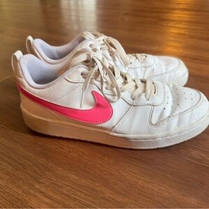 Nike Youth White Sneakers with Pink Swoosh Accent